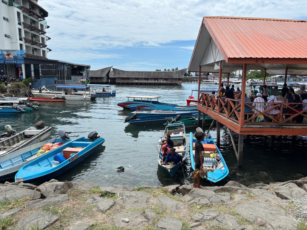 Boats loading at the Semporna jetty