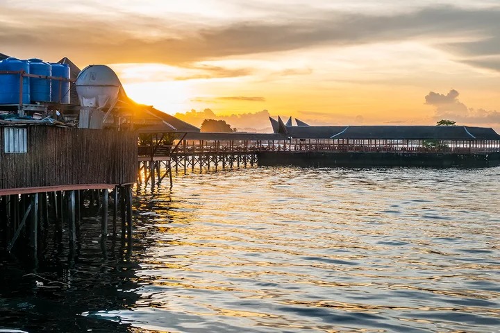 Semporna jetty with boats bound for Mabul Island